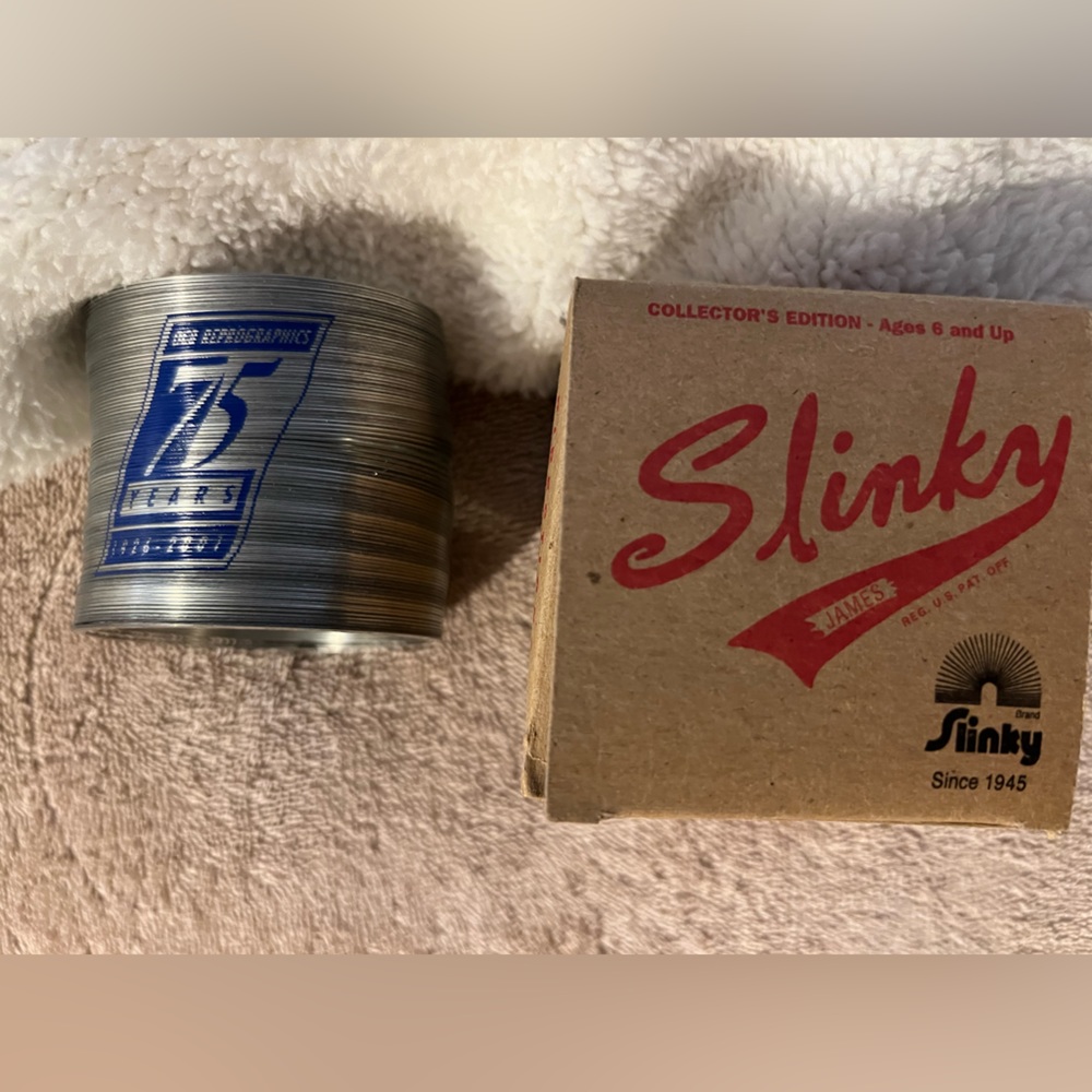 OCB Reprographics 75 year anniversary commemorative Slinky - from 2001